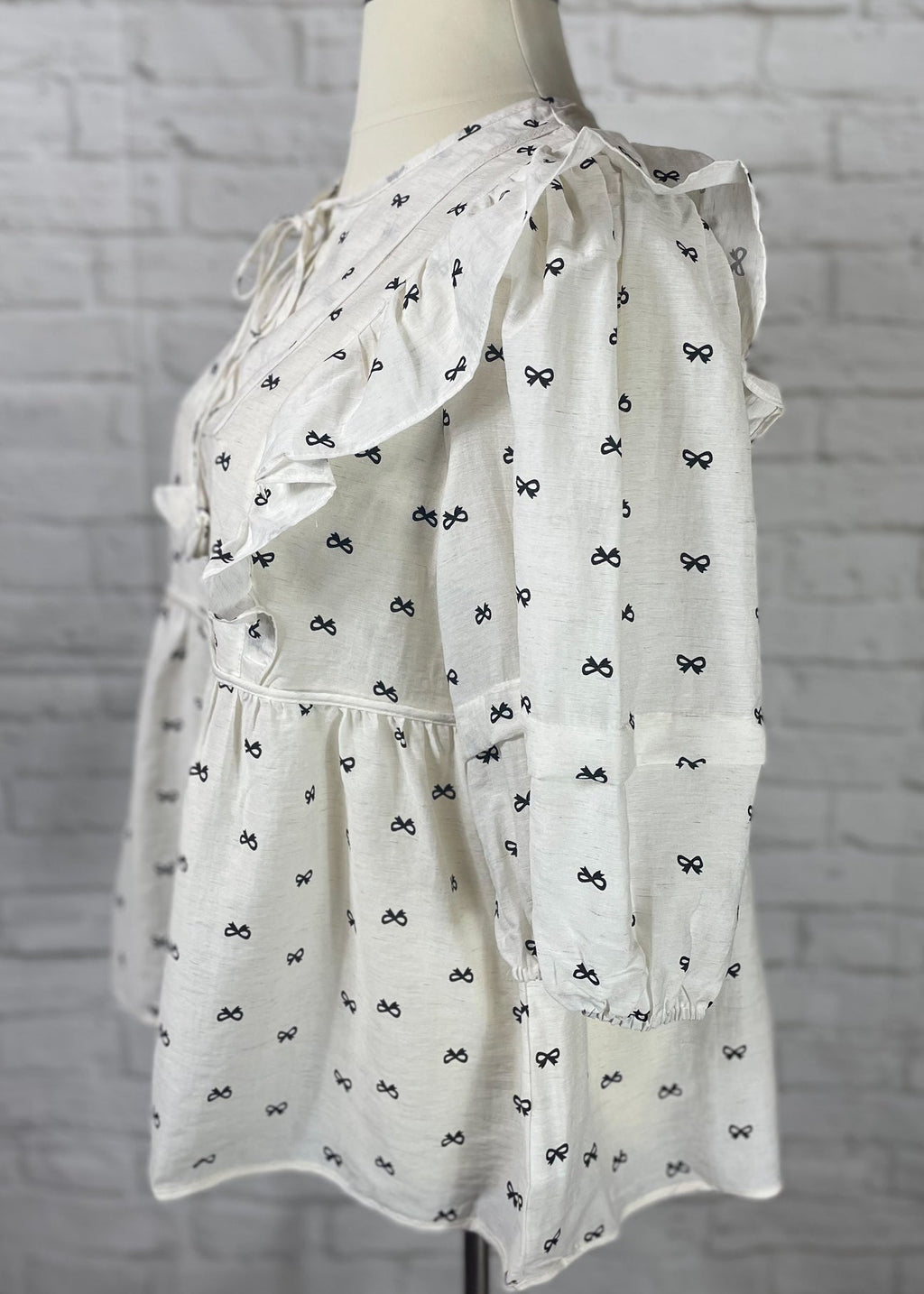 UMGEE Bow Peplum Top
