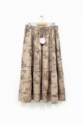 Complete full-length studio photo of tiered toile skirt