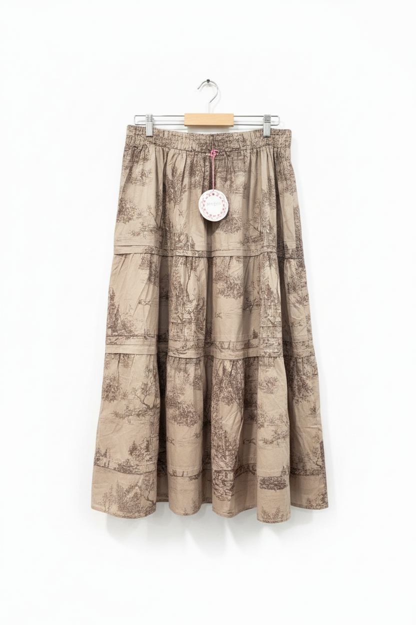 Complete full-length studio photo of tiered toile skirt